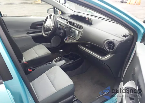 2014 Toyota Prius C Two z USA, uszkodzony, nr VIN JTDKDTB37E1074085